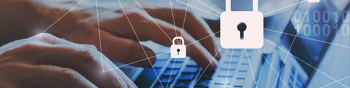 A person typing on a laptop and padlock graphics