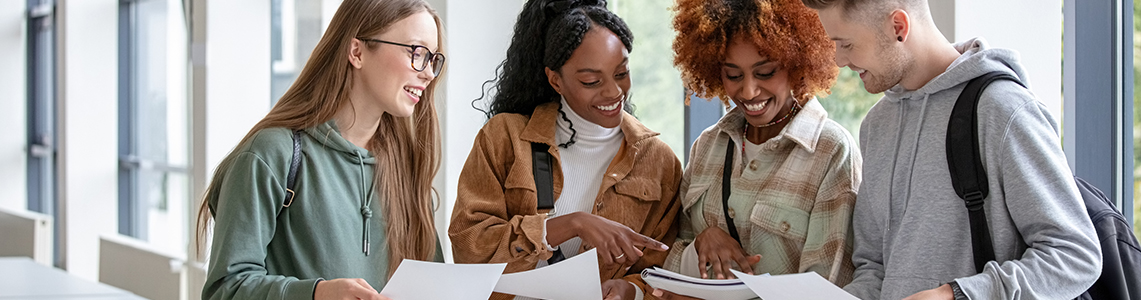 A group of students looking at their exam results.