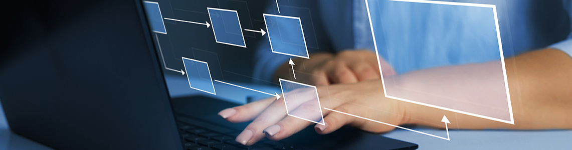 A person typing on a keyboard